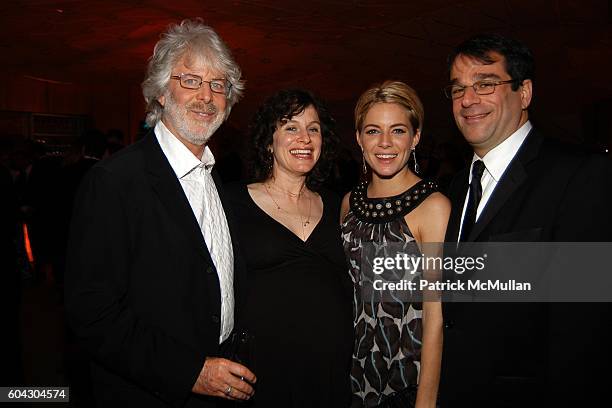 Charles Shyer, Deborah Lynn-Shyer, Sienna Miller and ? attend Vanity Fair Oscar Party at Morton's Restaurant on March 5, 2006.