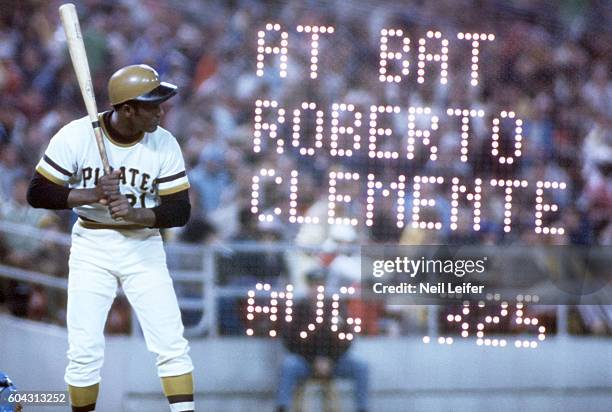 Double exposure view of Pittsburgh Pirates Roberto Clemente in action vs Los Angeles Dodgers at Three Rivers Stadium. View of writing from...