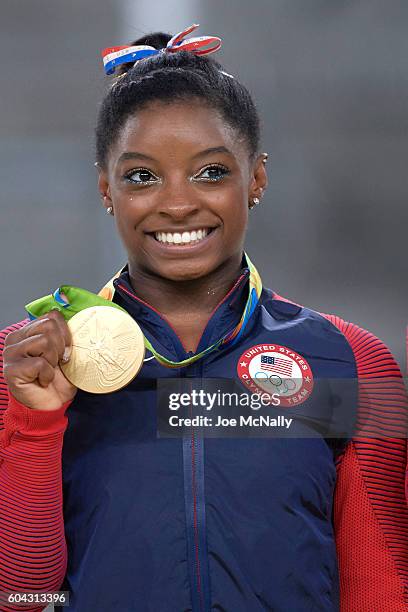 Summer Olympics: Closeup portrait of USA Simone Biles victorious with gold medal after Women's during Women's Floor Exercise Final at Rio Olympic...