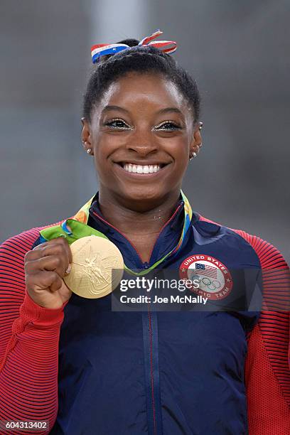 Summer Olympics: Closeup portrait of USA Simone Biles victorious with gold medal after Women's during Women's Floor Exercise Final at Rio Olympic...