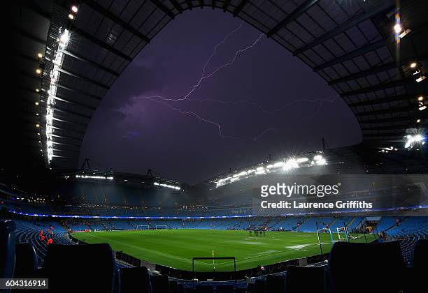General view inside the stadium as Lightning strikes following the postponement of the UEFA Champions League Group A match between Manchester City FC...