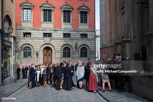 Guests lineup to attend a ceremony at Storkyrkan in connection with the opening session of the Swedish parliament on September 13, 2016 in Stockholm,...