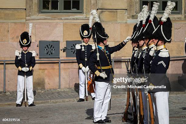 Swedish royal guards prepare for the arrival of the kind at a ceremony at Storkyrkan in connection with the opening session of the Swedish parliament...