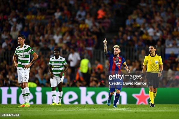 Lionel Messi of Barcelona celebrates scoring his sides first goal during the UEFA Champions League Group C match between FC Barcelona and Celtic FC...