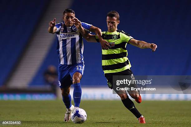 Anthony Knockeart of Brighton is tackled by Jonathan Hogg of Huddersfield during the Sky Bet Championship match between Brighton & Hove Albion and...