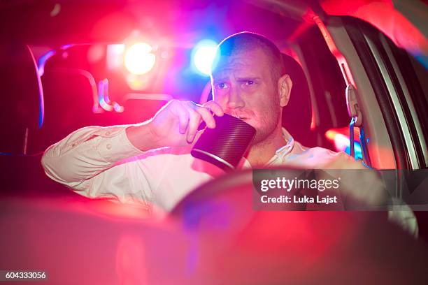 car in pursuit - drink driving stockfoto's en -beelden