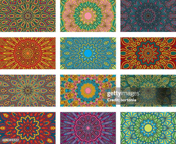 ornate circular mandala multicolored designs - culture of india stock illustrations