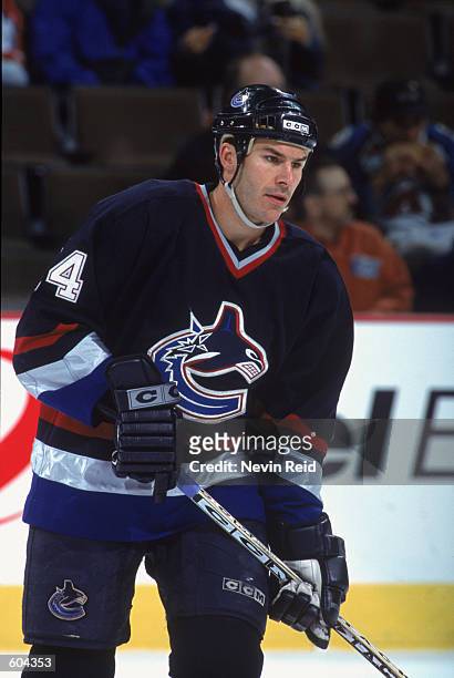 Scott Lachance of the Vancouver Canucks waits on the ice during the game against the Colorado Avalanche at the Pepsi Center in Denver, Colorado. The...