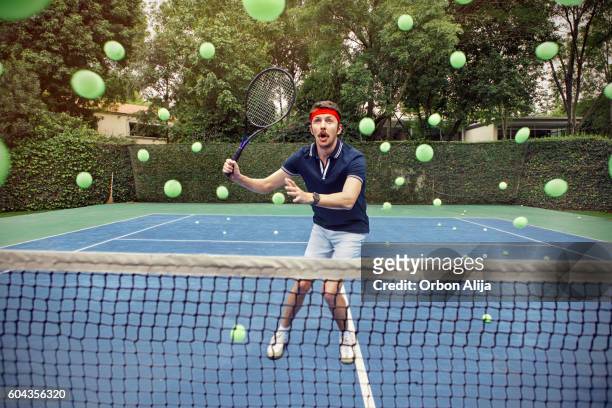 man playing tennis - man flying stockfoto's en -beelden