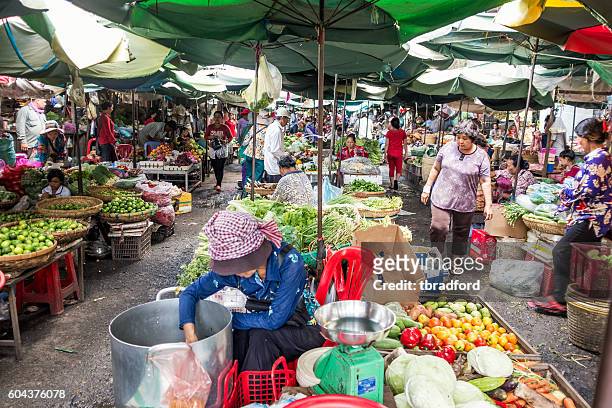 busy scene in kandal market in phnom penh, cambodia - cambodia food stock pictures, royalty-free photos & images