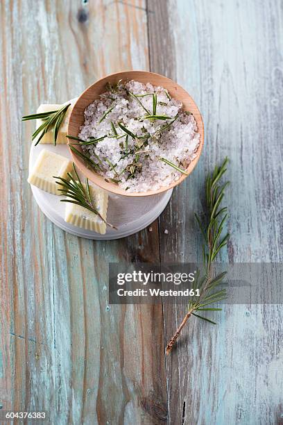 bath salt and bathpralines with herbs, rosemary, eucalyptus and pine, bowl - bath salt stock pictures, royalty-free photos & images