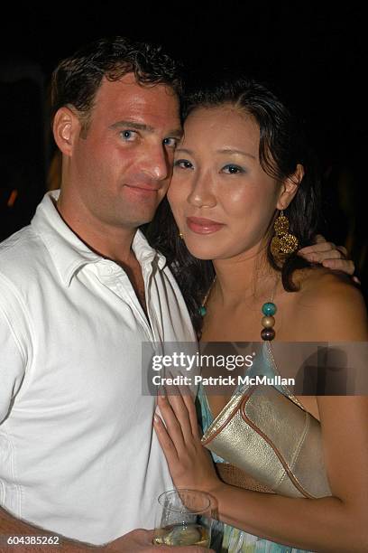 Ryan Q and Rose Jang attend Cocktail Party With Steven Schonfeld Celebrating Mindy Greenblatt's Birthday at Watermill on August 19, 2006.