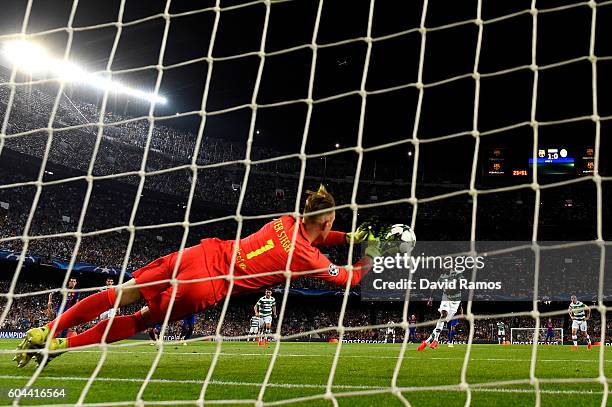 Marc-Andre ter Stegen of Barcelona saves a penalty from Moussa Dembele of Celtic during the UEFA Champions League Group C match between FC Barcelona...