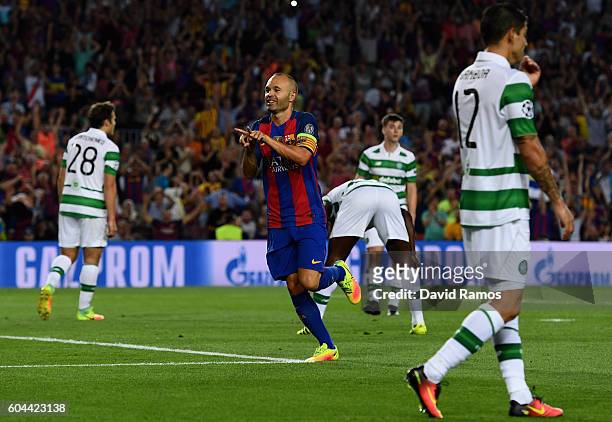 Andres Iniesta of Barcelona celebrates scoring his sides fourth goal during the UEFA Champions League Group C match between FC Barcelona and Celtic...