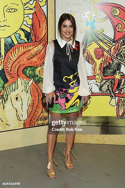Camila Coelho attends the Alice + Olivia by Stacey Bendet Spring/Summer 2017 Presentation during New York Fashion Week September 2016 at Skylight at...
