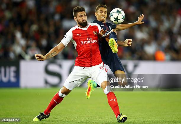 Marco Verratti of PSG and Olivier Giroud of Arsenal in action during the UEFA Champions League Group A match between Paris Saint-Germain and Arsenal...