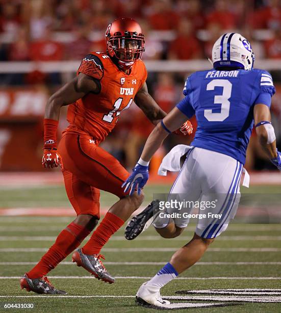 Brian Allen of the Utah Utes defends Colby Pearson of the Brigham Young Cougars during the second half, at Rice Eccles Stadium on September 10, 2016...