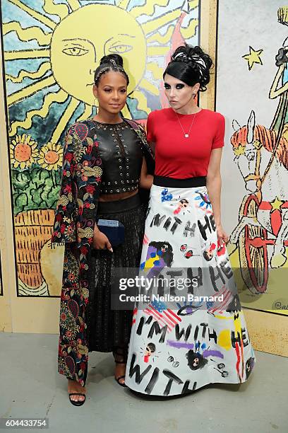 Singer Christina Milian and CEO & Creative Director of Alice + Olivia Stacey Bendet attend the Alice + Olivia By Stacey Bendet fashion show during...