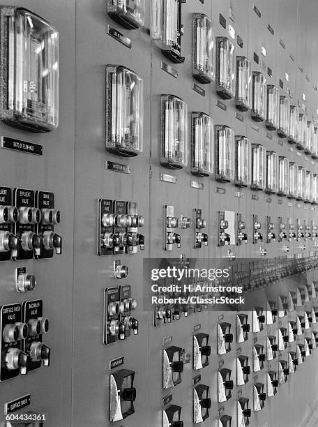 1960s ANGLED VIEW OF KNOBS & METERS CONTROLLING WATER FLOW INTO FILTERS AT PURIFICATION PLANT