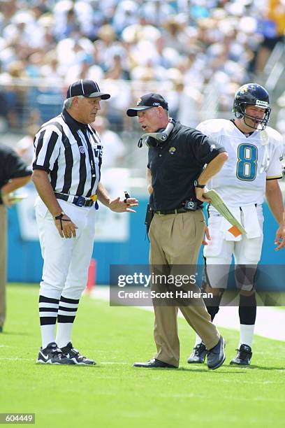 Replacement official discusses a call with Jaguar Head Coach Tom Coughlin during the game between the Pittsburgh Steelers and the Jacksonville...