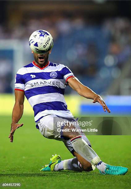 Steven Caulker of Queens Park Rangers reaches for the ball and shortly leaves the pitch injured during the Sky Bet Championship match between Queens...
