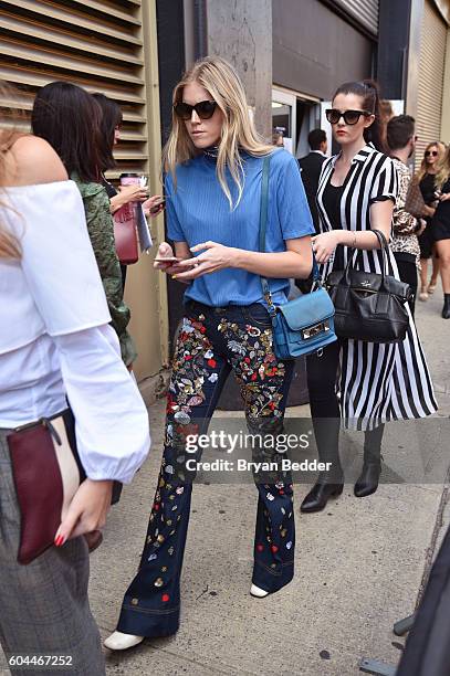 Fashion goer attends the Alice + Olivia by Stacey Bendet Spring/Summer 2017 Presentation during New York Fashion Week September 2016 at Skylight at...