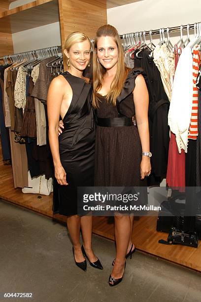 Amy Smart and Kristin Eberts attend Opening of AURA hosted by Kristin Eberts and Amy Smart at Los Angeles on August 16, 2006.