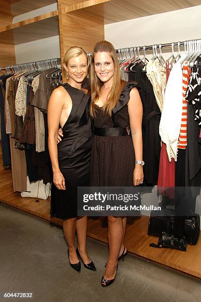 Amy Smart and Kristin Eberts attend Opening of AURA hosted by Kristin Eberts and Amy Smart at Los Angeles on August 16, 2006.