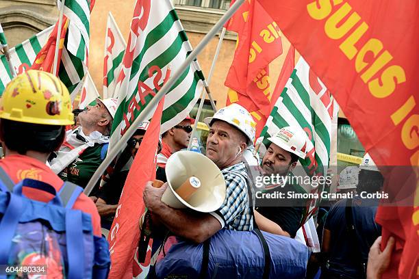 Former Alcoa workers, of Portovesme in Sardinia, protesting at the Ministry of Economic Development, to ask the Government Renzi to say what his...