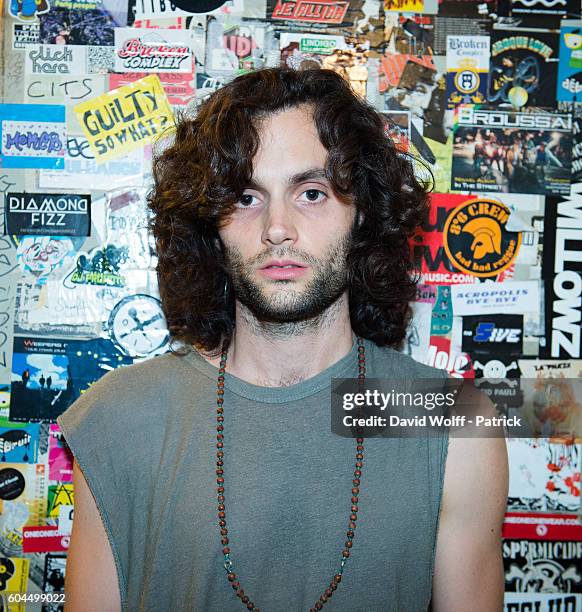 Penn Badgley from MOTHXR poses backstage at La Maroquinerie on September 13, 2016 in Paris, France.