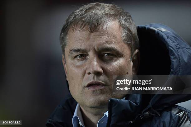 Argentina's San Lorenzo coach Diego Aguirre gestures during the Copa Sudamericana football match against Argentina's Banfield at Pedro Bidegain...