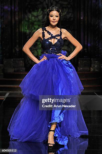 Model walks the runway wearing Lisseth Corrao at Art Hearts Fashion NYFW The Shows presented by AIDS Healthcare Foundation at The Angel Orensanz...