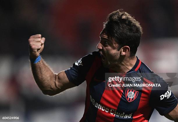 Argentina's San Lorenzo forward Martin Cauteruccio celebrates after scoring the team's fourth goal against Argentina's Banfield during their Copa...