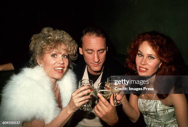 American actresses Gail Brown with her sister, Karen Black and Paul Williams at the 'Chanel Solitaire' Premiere in New York City, January 9th 1982.