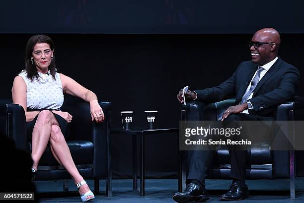Actress Hiam Abbass and moderator Cameron Bailey speak onstage during an In Conversation With... Hiam Abbass during the 2016 Toronto International...