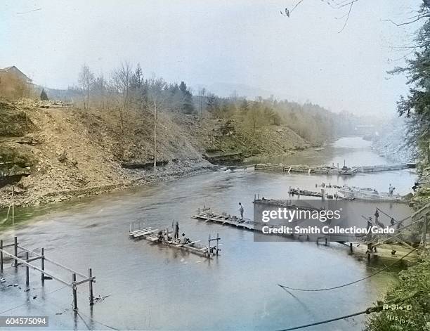 Ashokan Reservoir, view at site of Olive Bridge dam, showing coffer-dam and piers under construction for supporting the 8-foot pipes to carry the...