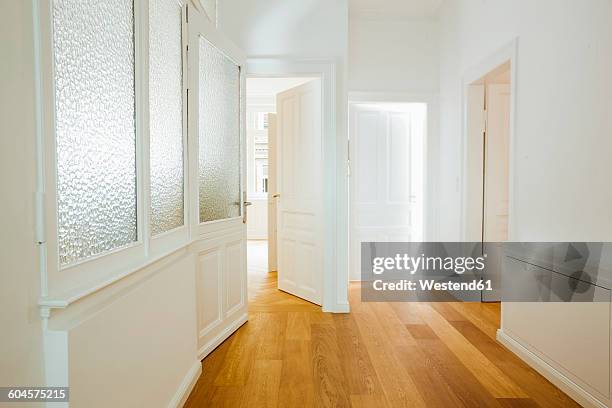 house with empty rooms and open doors - door ajar stock pictures, royalty-free photos & images