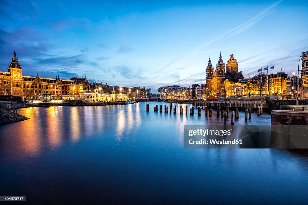 Netherlands, Holland, Amsterdam, Central Station in the evening