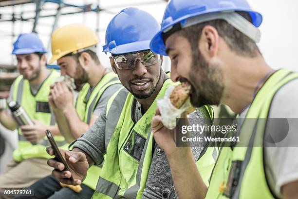 79 Construction Workers Eat Lunch Together Stock Photos High Res 79-construction-workers-eat-lunch-together-stock-photos-high-res
