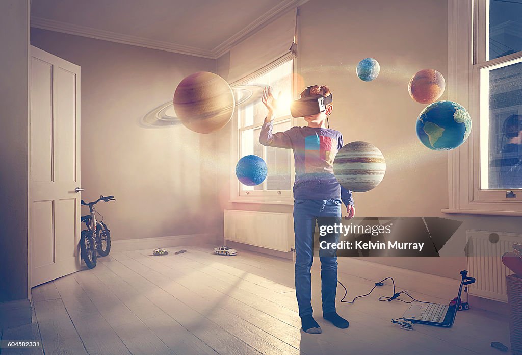 Boy explores virtual reality solar system