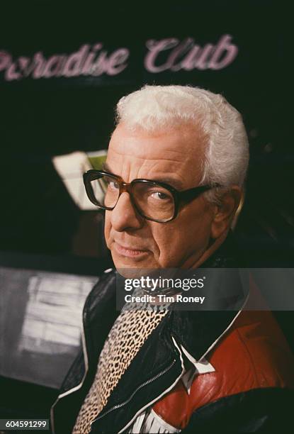 British writer and comedian Barry Cryer outside The Paradise Club in an episode of the television show 'The Detectives', circa 1993.