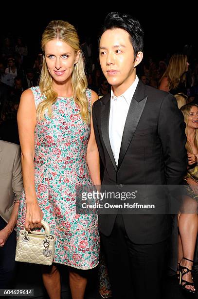 Nicky Hilton and pianist Yundi Li attend the Dennis Basso SS17 fashion show during New York Fashion Week at The Arc, Skylight at Moynihan Station on...