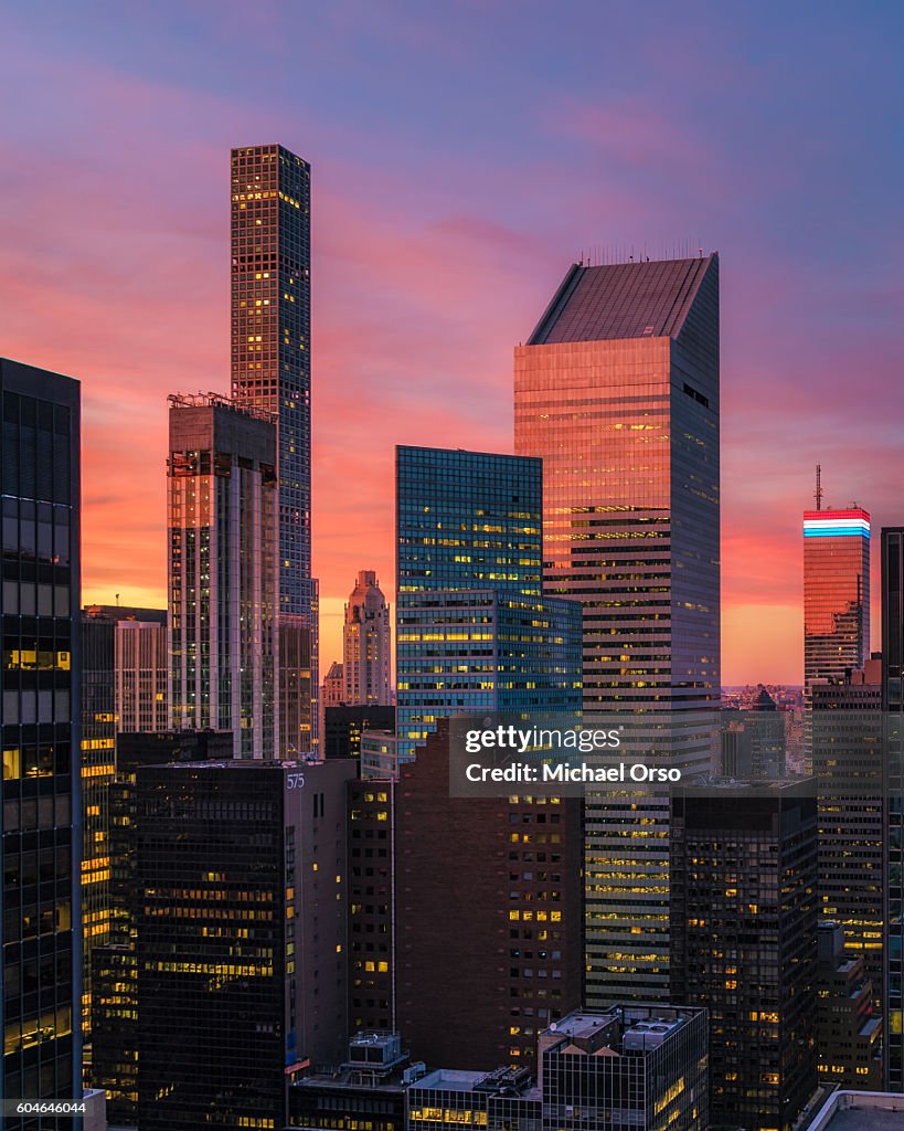 432 park avenue, Citicorp, Citigroup Center Citibank building. Unique rooftop view during and colorful sunset in Manhattan.