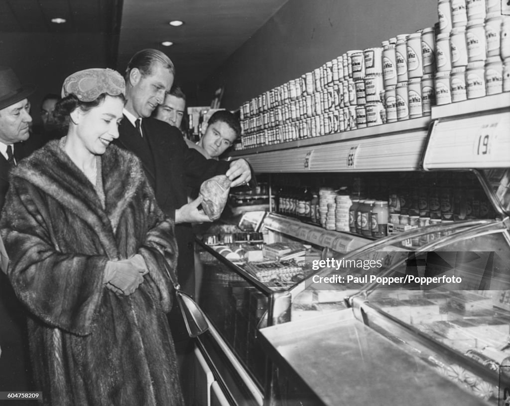 Queen Elizabeth II And Prince Philip Visit A Supermarket