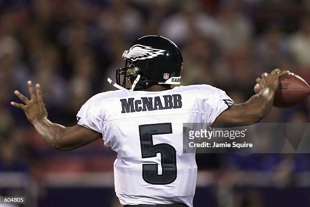 Donovan McNabb of the Philadelphia Eagles passes the ball during the game against the New York Giants at Giants Stadium at the Meadowlands in East...