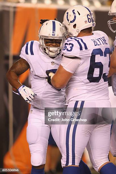 Tevaun Smith of the Indianapolis Colts celebrates a touchdown with teammate Austin Blythe during their game against the Cincinnati Bengals at Paul...