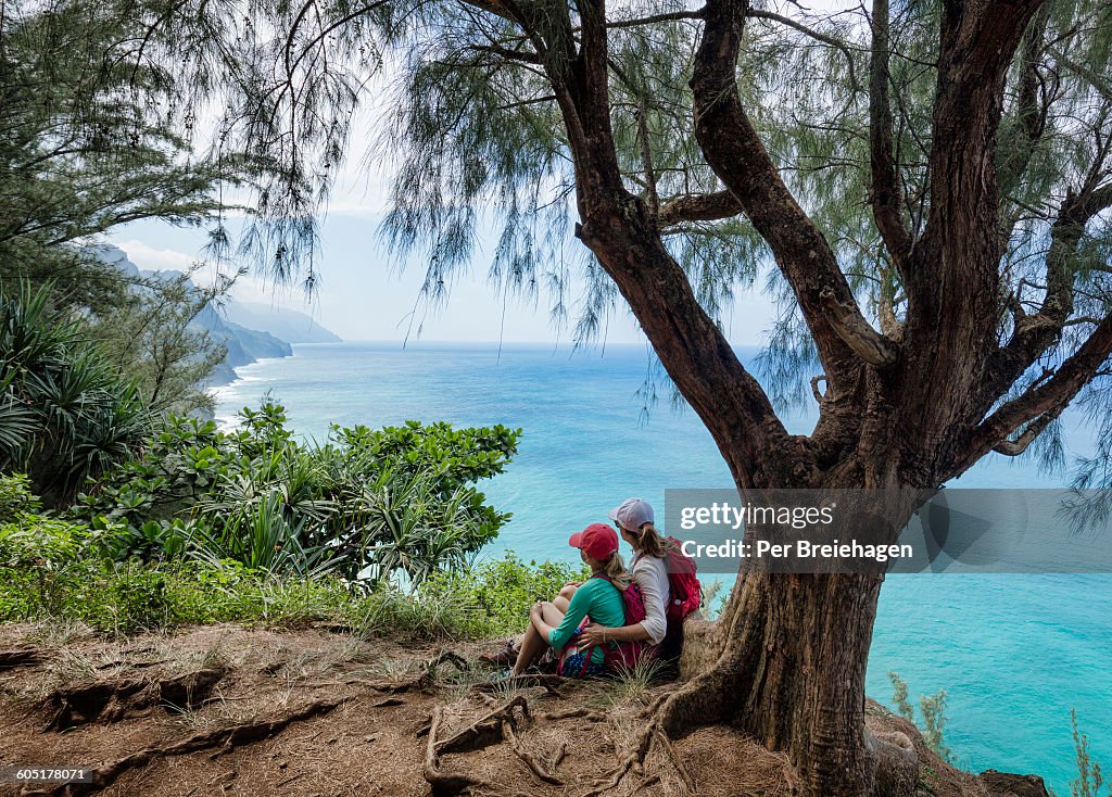 Mother and daughter hiking Na Pali Coast