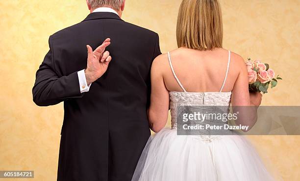 father/ groom fingers crossed - back stock pictures, royalty-free photos & images