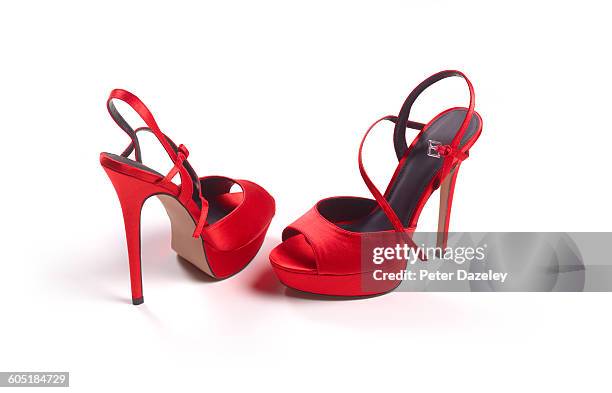 red stilettos - red platform shoes stock pictures, royalty-free photos & images