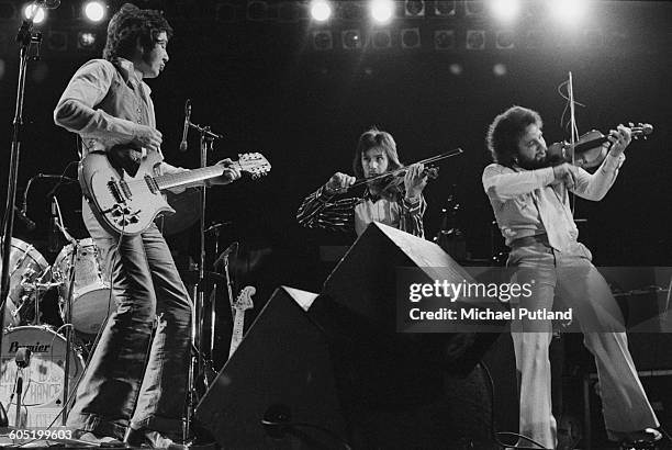 Ronnie Lane's Slim Chance performing at The Great British Music Festival, Olympia, London, 2nd January 1976. Left to right: Ronnie Lane, Steve...